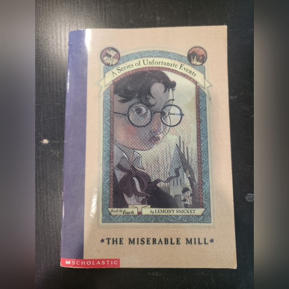 Scholastic The Miserable Mill Book - Blue and Beige Cover